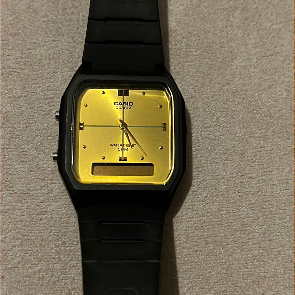 Casio Black Resin Band and Gold Face Analog watch
